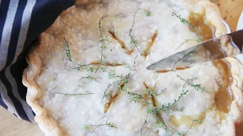 Cutting turkey pot pie Stock Footage 102740967