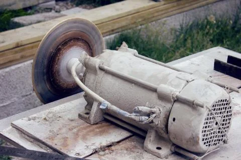 Cutting using an angle grin Stock Photos