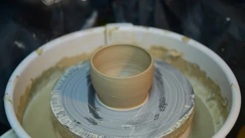 Cutting vase of white clay close-up slow motion Stock Footage 148265006