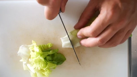 Cutting vegetables Stock Footage 112202985