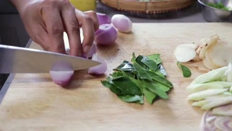 Cutting vegetables fresh onion, Thai herb lemongrass, galangal, kaffir lime leaf Stock Footage 155308431
