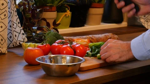 Cutting vegetables in the kitchen Video stock 89003881