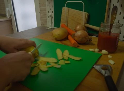Cutting vegetables in the kitchen Foto stock