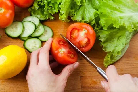 Cutting vegetables Stock Photos