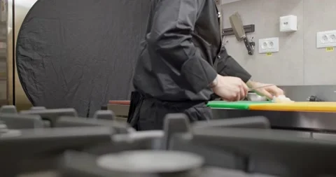 Cutting Vegetables on Plastic Board Hand Close Up Kitchen Chef Vídeo Stock 138142559
