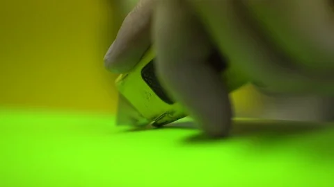 Cutting Vinyl with a Utility Knife Stock Footage 76863482
