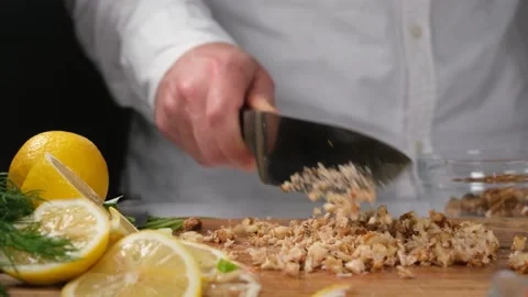 Cutting walnut kernel Stock Footage 228825764