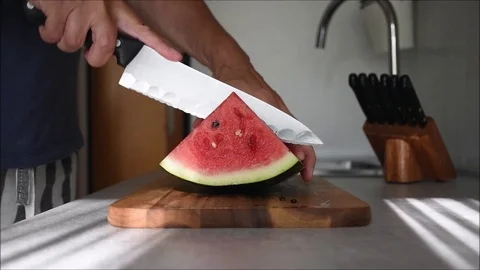 Cutting watermelon Stock Footage 113992154