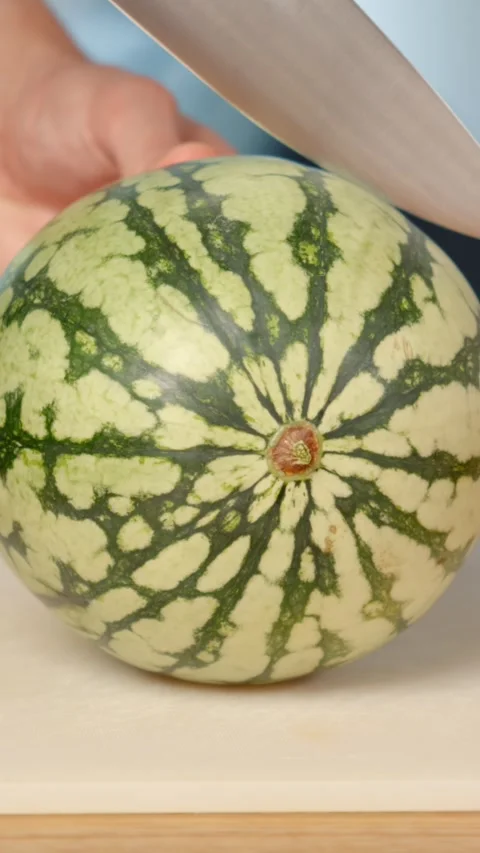 Cutting Watermelon in Half Close up Stock Footage 343938555