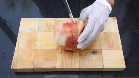 Cutting watermelon into pieces Stock Footage 251154045