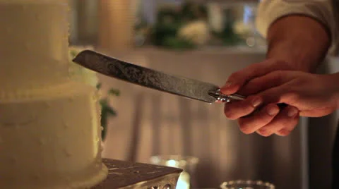 Cutting the Wedding Cake CU Stock Footage 22858402