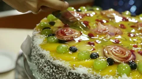 Cutting of wedding cake with fruit Stock Footage 12209018