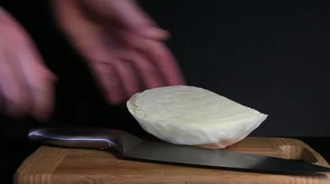 Cutting the white cabbage Video stock 10831931