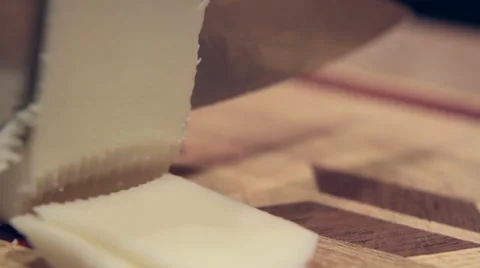 Cutting White Cheese Slices - Close Up Stock Footage 34480722