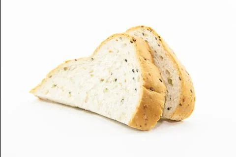 Cutting whole grain bread for breakfast Stock Photos