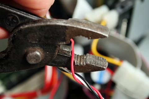 Cutting wire connection Stock Photos