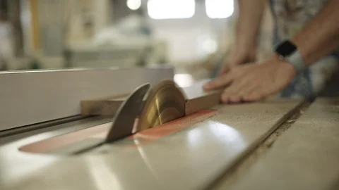 Cutting wood with saw. Stock Footage 128773340