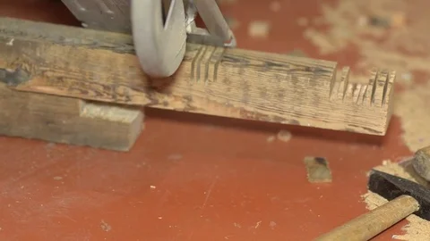 Cutting wooden Board with electric saw close-up, home repair Video stock 74982353