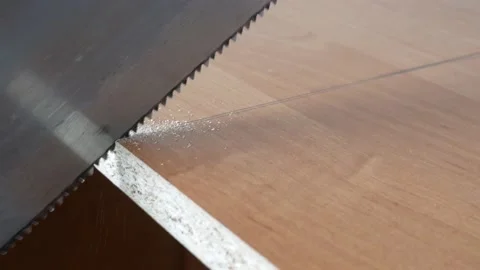 Cutting a wooden board Stock Footage 138873573