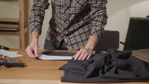 Cutting wool fabric. the line pattern. Bow ties of woolen fabric. Young man Stock Footage 83040834