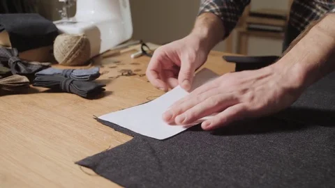Cutting wool fabric. the line pattern. Bow ties of woolen fabric. Young man 스톡 동영상 83041417
