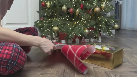 Cutting Wrapping Paper For Christmas Gift Preparation Holiday Packaging Process Stock Footage 344881941
