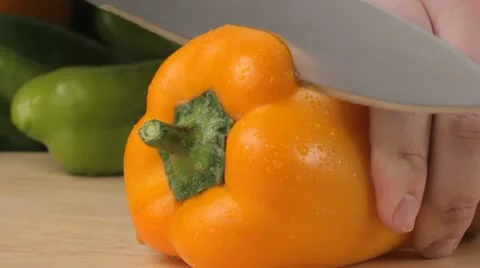 Cutting a yellow pepper Video stock 22267849