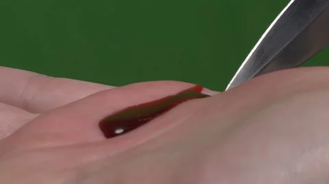 Cutting your palm Stock Footage 49861673