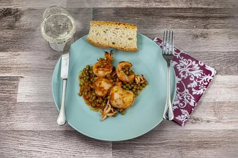 Cuttlefish and peas dish composition Foto stock