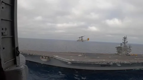 CV-22 Osprey taking off from U.S. Navy aircraft carrier USS Nimitz (CVN 68) Stock Footage 280385699