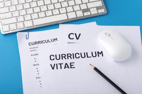CV, curriculum vitae with computer keyboard and mouse on blue background, job 스톡 사진