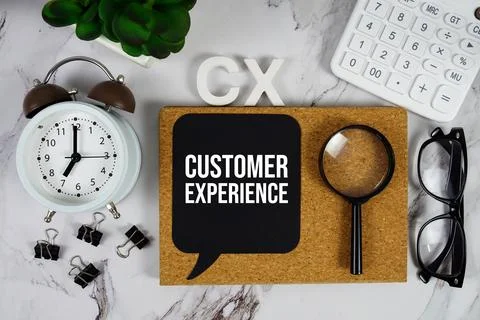 CX - Customer Experience acronym with calculator, alarm clock and magnifyin.. Stock Photos