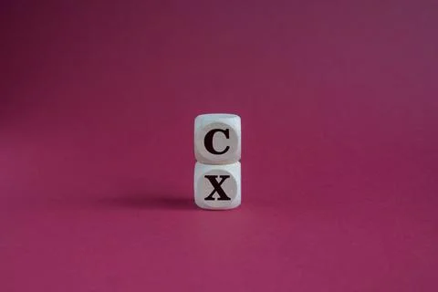 CX customer experience symbol. Concept words CX on wooden cubes Stock Photos