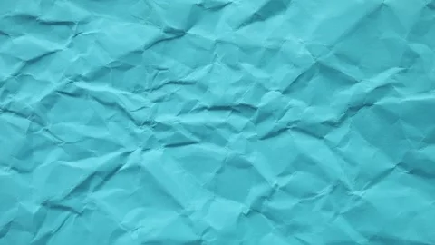 Cyan Animated Crumpled Paper Texture Background Loop Vídeos de archivo 333965152