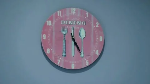 Cyan blue cement wall background n pink clock at dinning cuisine Time Lapse Stock-Footage 174678882