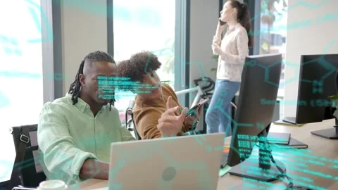 Cyan code drifting triggers two colleagues, left typing, right pointing to debug Stock Footage 333211234