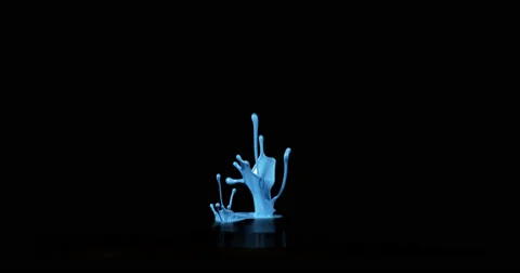 Cyan paint in motion in 4K Stock Footage 59919132