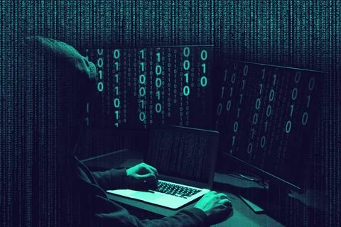Cyber attack. Anonymous hacker working with computers on dark background. D.. 写真素材