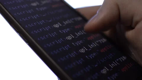 Cyber attack code on the iphone screen. mobile phone cyber security. Stock Footage 231222587