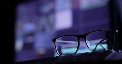 Cyber attack concept. glasses on the keyboard, on the background of the monitor Stock Footage 82905832