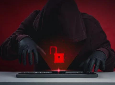 Cyber attack concept with hooded hacker and glowing unlocked padlock on sma.. 스톡 사진