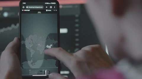 Cyber attack, Cyber security and global network concept. World map on mobile Stock Footage 250363464