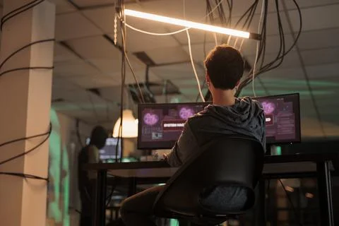 Cyber attack, hacker using spyware, breaking into database server Fotos de archivo