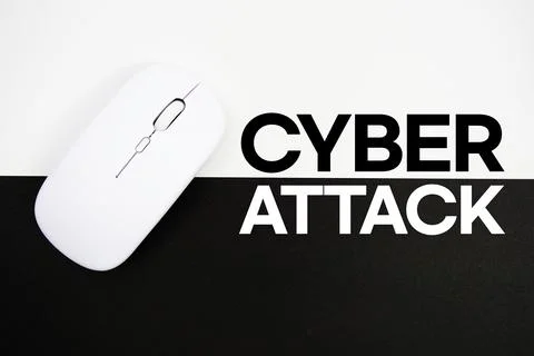 Cyber Attack text and wireless mouse on white and black background Stock Photos