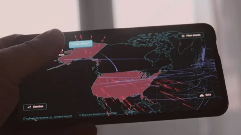 Cyber attacks over North and South America. Camera shot mobile screen. Cyber Stock Footage 249803506