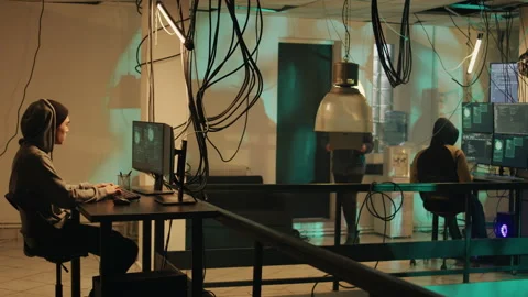 Cyber criminal committing cryptojacking and espionage crime Video stock 228888537