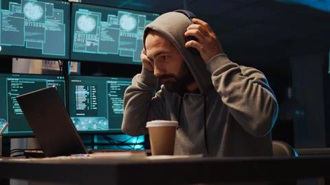 Cyber criminal hacking system to destroy information Stock Photos