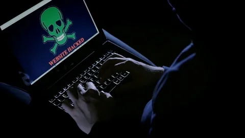 Cyber criminal hacking the website on the laptop in the night Stock Footage 72544490