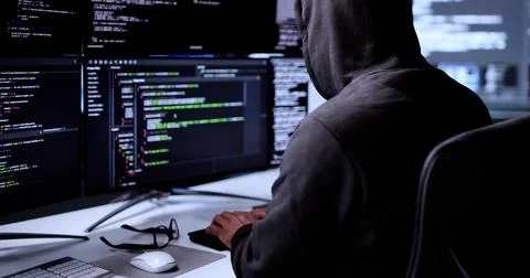 Cyber Criminal Stealing Secure Data; Programmer Hacking Online Information. Stock-Fotos