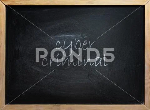 Cyber Criminal Text On School Board Stock Photos